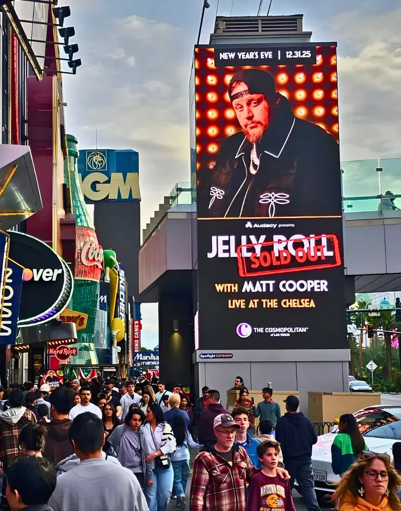 VSTN Network LED media tower above crowds on the Las Vegas Strip