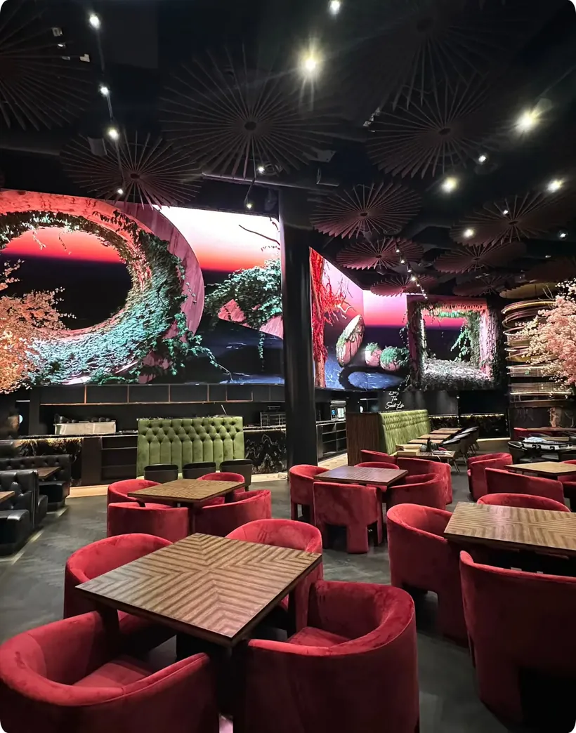 Curved LED walls around the dining room at Three Thirty Three