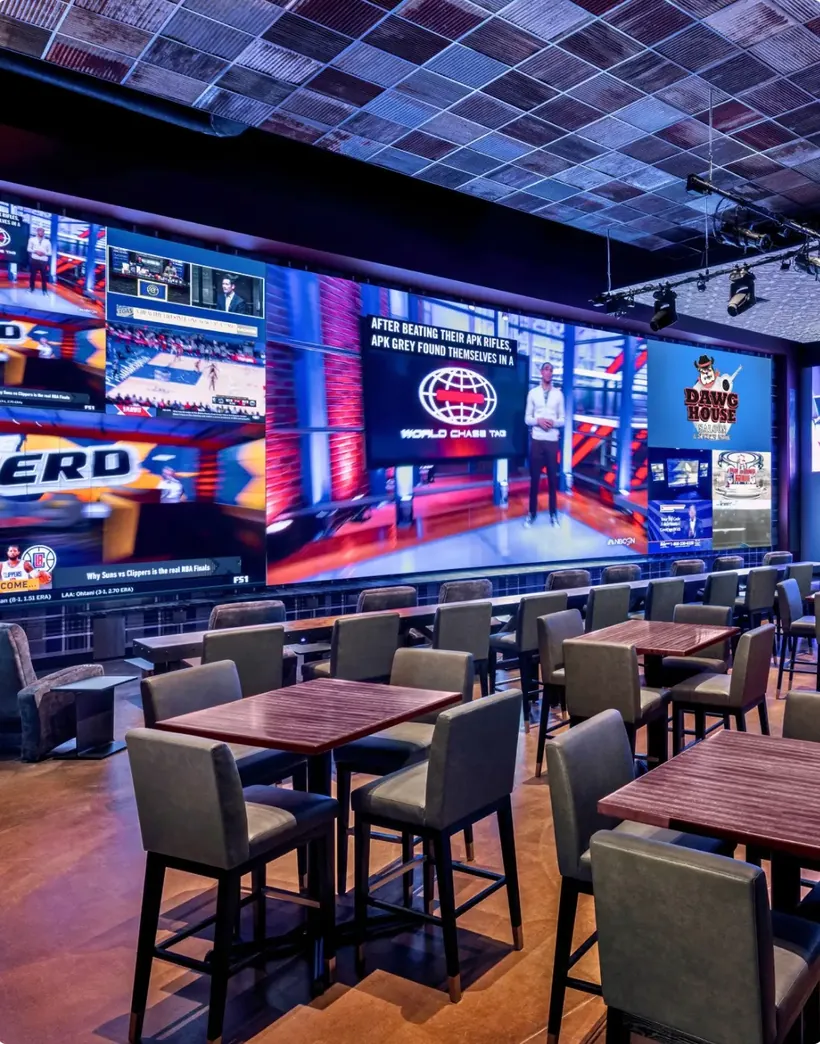 LED video walls above the seating at the Resorts World Las Vegas Sports Book
